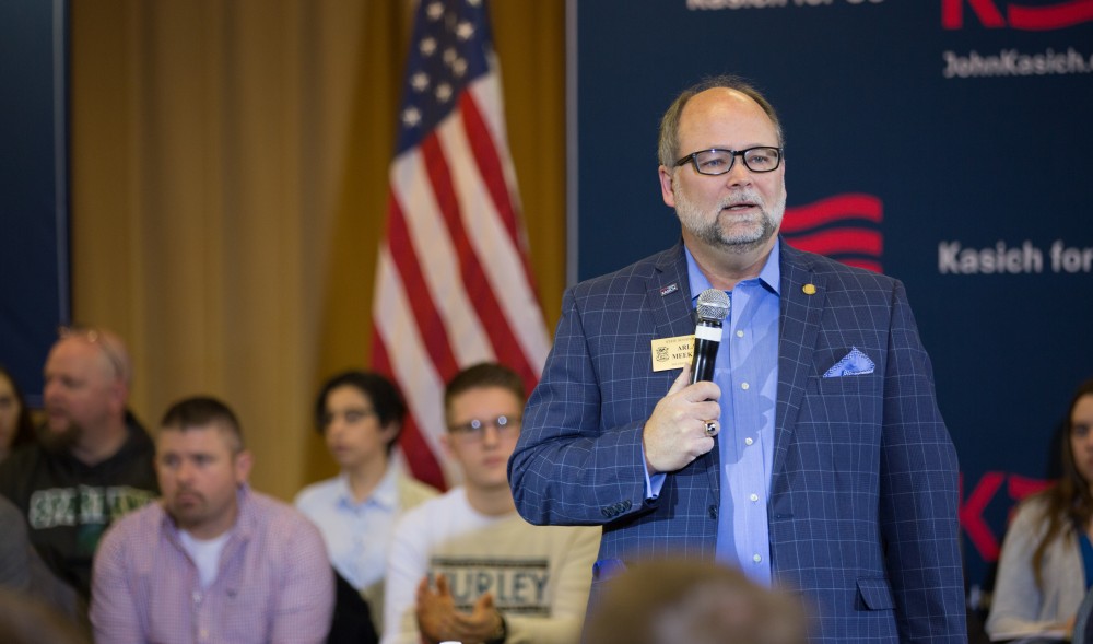 GVL / Kevin Sielaff - Michigan Senate Majority Leader Arlan Meekhof introduces John Kasich.  Governor of Ohio and Republican presidential hopeful John Kasich speaks inside the Grand River Room in Kirkhof Monday, Feb. 15, 2016.