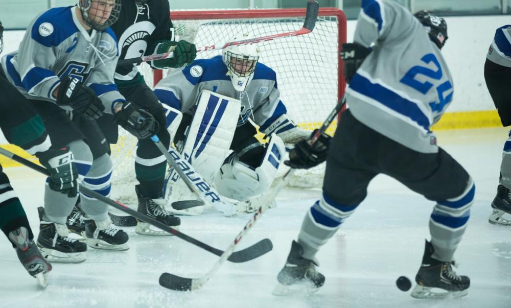 GVL / Kevin Sielaff - Goaltender Jack Lindsay (1) holds down the game for the Lakers. The Lakers’ D3 men’s hockey team blows out Michigan State at Eagle Ice Center in Grand Rapids on Friday, February 12, 2016.