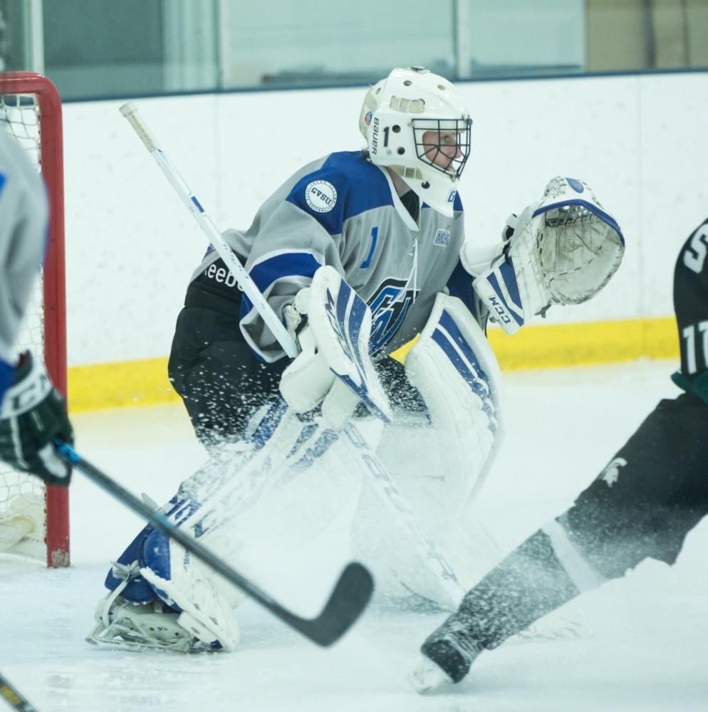 GVL / Kevin Sielaff - Goaltender Jack Lindsay (1) holds down the game for the Lakers. The Lakers’ D3 men’s hockey team blows out Michigan State at Eagle Ice Center in Grand Rapids on Friday, February 12, 2016.