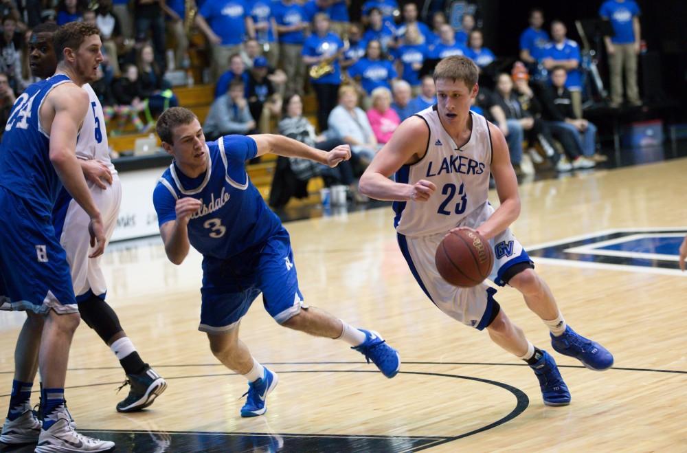 GVL / Kevin Sielaff - Luke Ryskamp (23) drives on net.  The Lakers defeat the Chargers of Hillsdale College Saturday, Jan. 30, 2016 in Allendale.