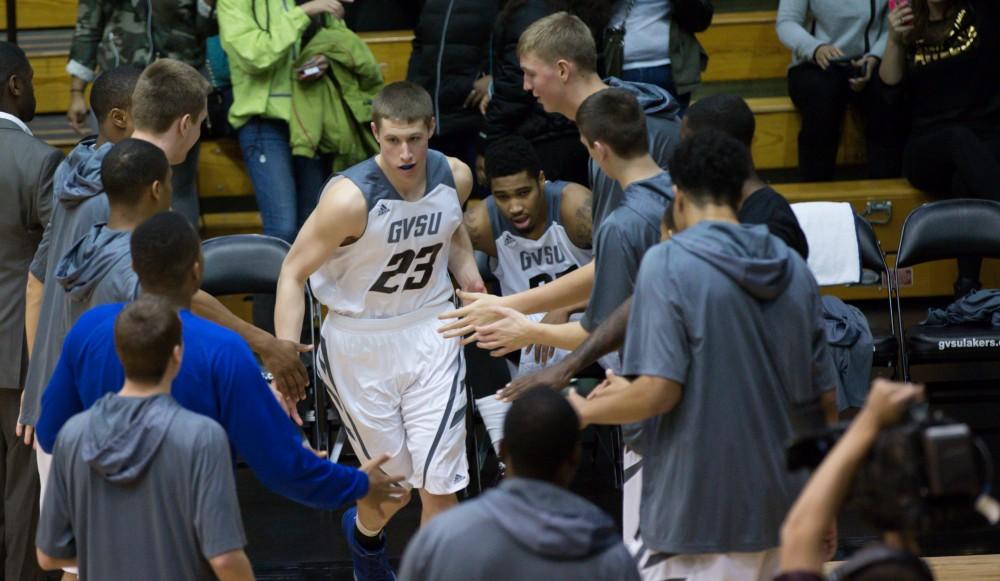 GVL / Kevin Sielaff - Luke Ryskamp (23) heads onto the court before the match. The Lakers defeat the Cardinals of SVSU with a final score of 76-73 in Allendale.