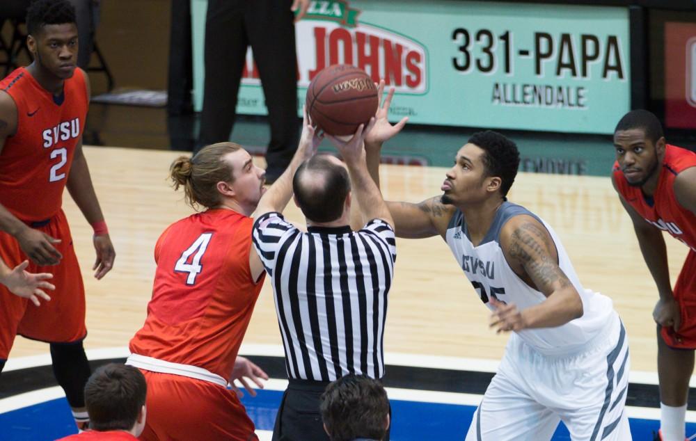 GVL / Kevin Sielaff - Chaz Rollins (25) prepares to take the first jump ball of the game. The Lakers defeat the Cardinals of SVSU with a final score of 76-73 in Allendale.