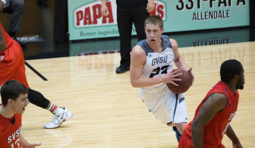 GVL / Kevin Sielaff - Luke Ryskamp (23) drives into the paint. The Lakers defeat the Cardinals of SVSU with a final score of 76-73 in Allendale.