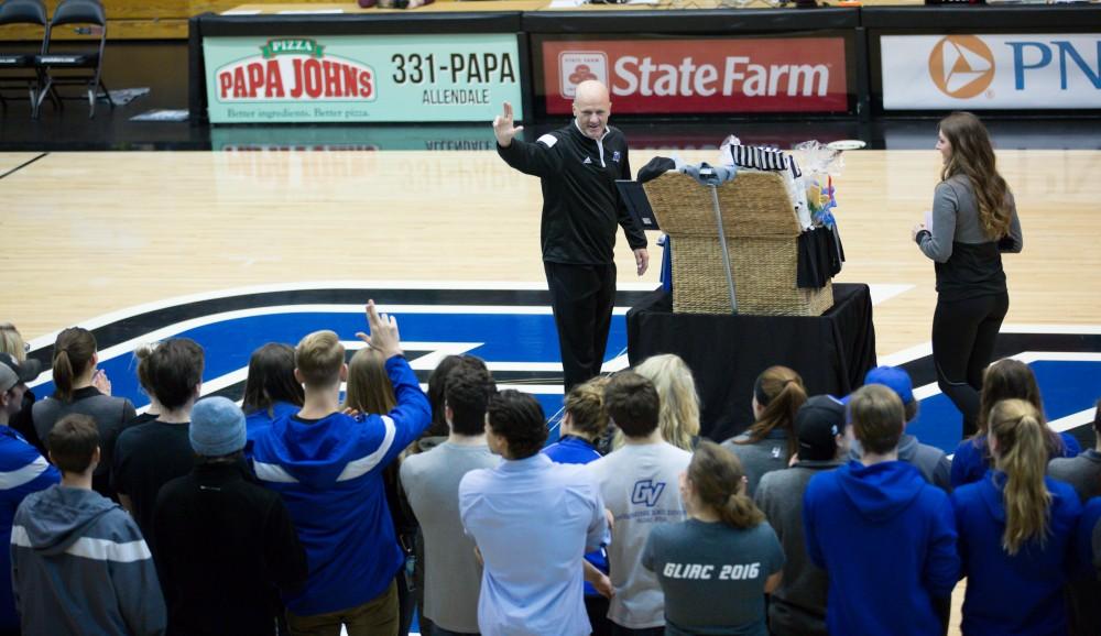 GVL / Kevin Sielaff - Tim Selgo is honored at half time by GVSU athletes. The Lakers defeat the Cardinals of SVSU with a final score of 76-73 in Allendale.