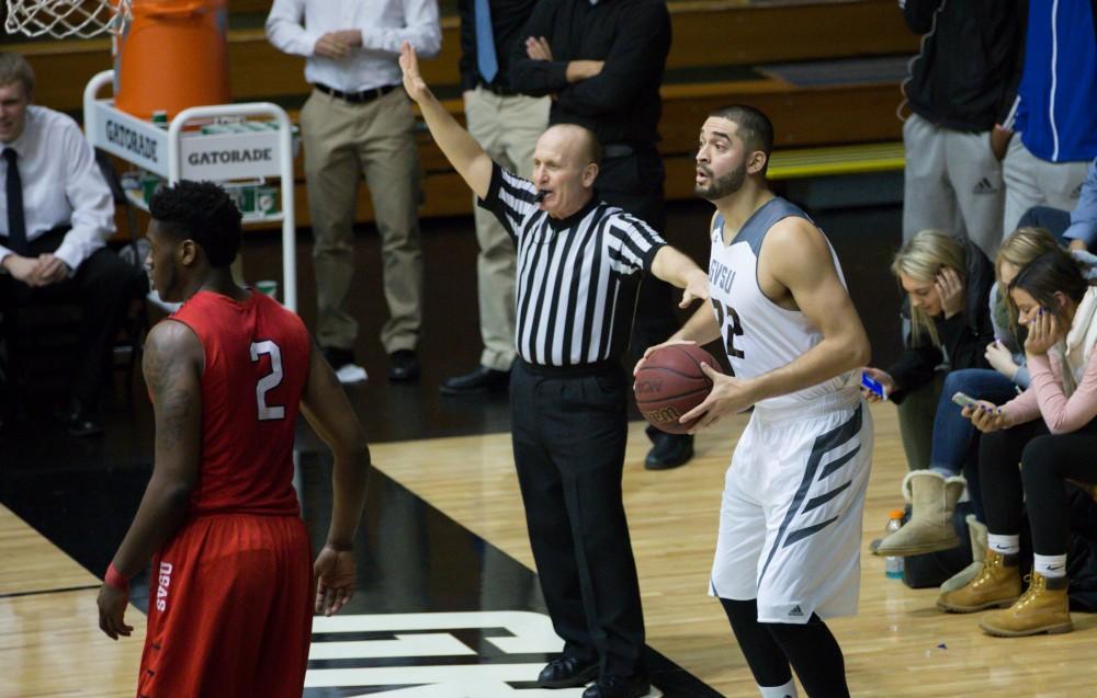 GVL / Kevin Sielaff - Ricardo Carbajal (32) looks to pass the ball while SVSU presses. The Lakers defeat the Cardinals of SVSU with a final score of 76-73 in Allendale.