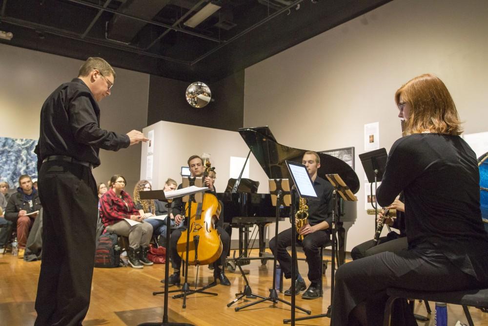 GVL / Sara Carte - Music Director, Bill Ryan, and music students perform at the New Music Ensemble Student Competition in the Performing Arts Center on Thursday, Feb. 25, 2016.