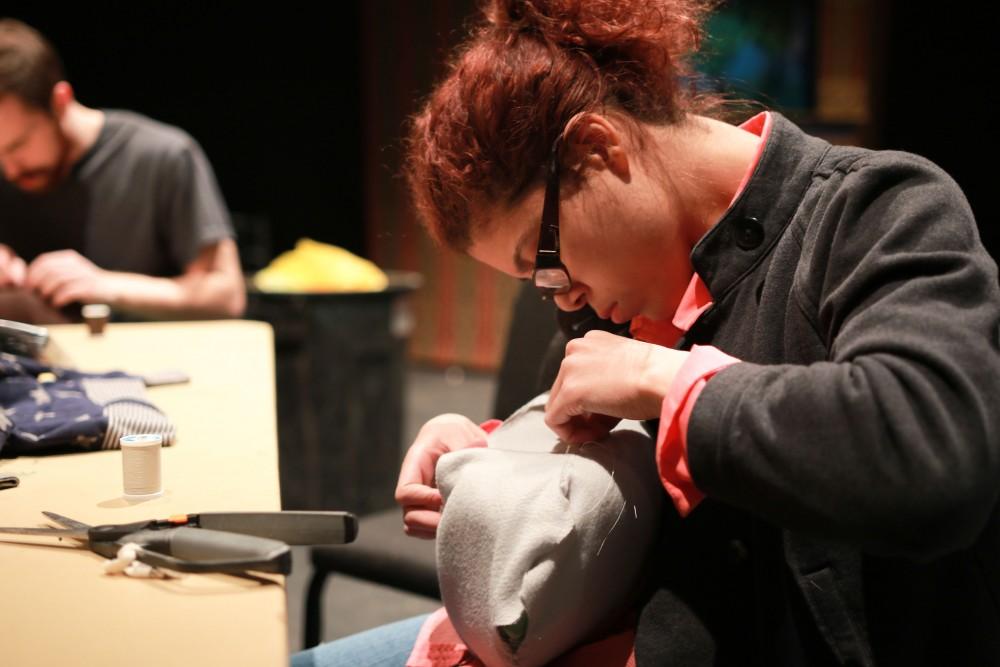 GVL / Sara Carte - Grand Valley student, Monica Longstreet, makes a puppet during the puppet show workshop in the Louis Armstrong Theatre in the Perfroming Arts Center on Friday, Feb. 19, 2016.