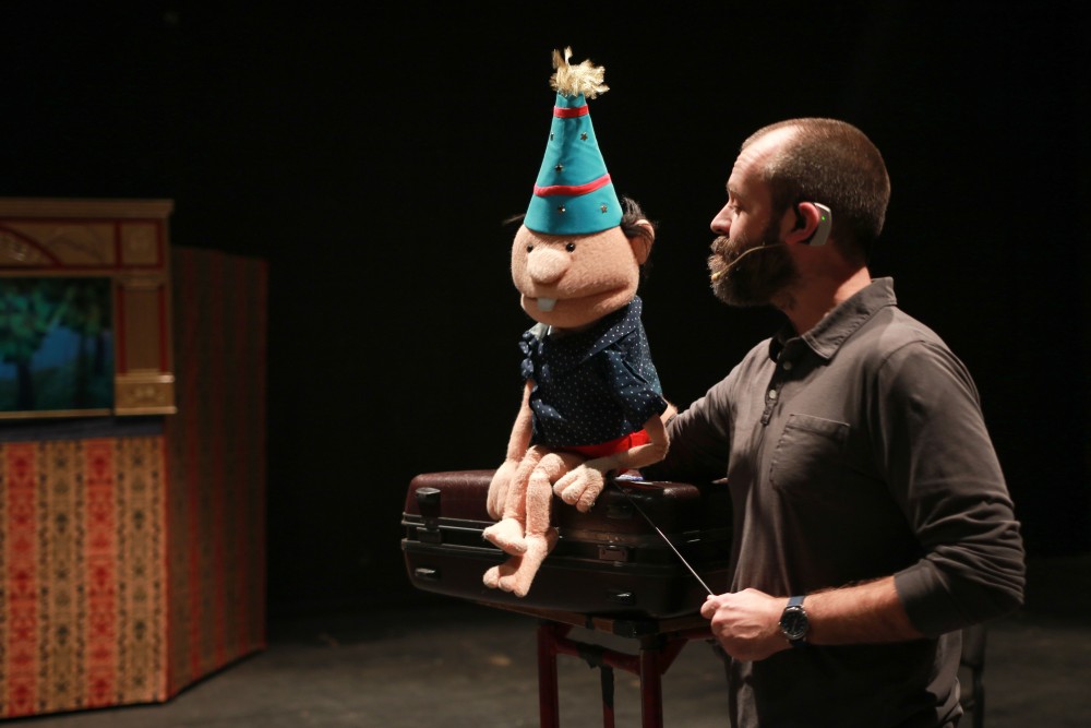 GVL / Sara Carte - Local puppeteer of Grand Rapids, Kevin Kammeraad, performs with his puppet Jacob during the puppet show workshop in the Louis Armstrong Theatre in the Perfroming Arts Center on Friday, Feb. 19, 2016.