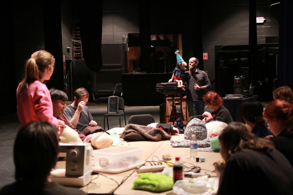 GVL / Sara Carte - Local puppeteer of Grand Rapids, Kevin Kammeraad, performs with his puppet Jacob during the puppet show workshop in the Louis Armstrong Theatre in the Perfroming Arts Center on Friday, Feb. 19, 2016.