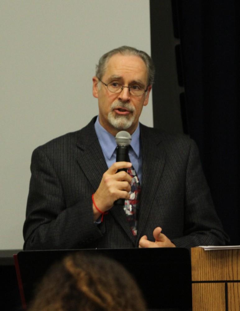 Dr. Chamberlain welcomes students, faculty, and guests to the Scarlet Cord Exhibit and Screening on Feb. 4 in Allendale, MI. 