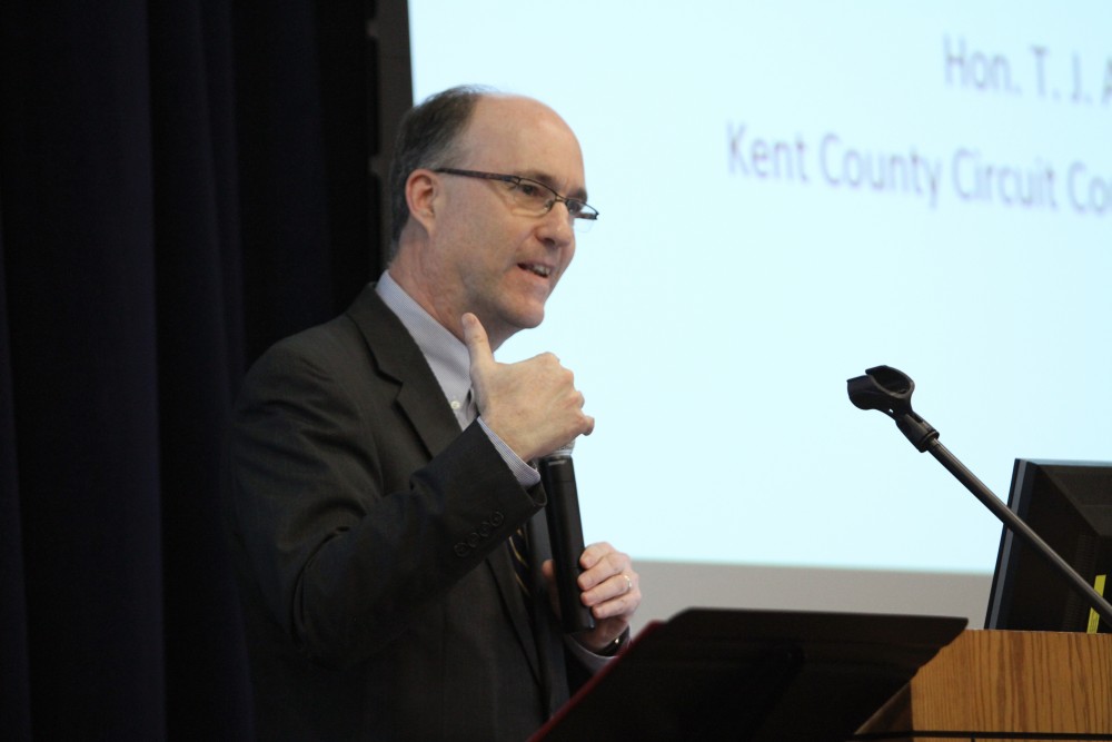 Judge T.J. Ackert was one of the three speakers at the Scarlet Cord Exhibit and Screening on Feb. 4 in Allendale, MI. 