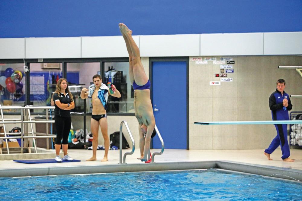 GVL / Emily Frye
Sophomore Jared Gregory practices his dives during the interclub meet on Oct. 10th.