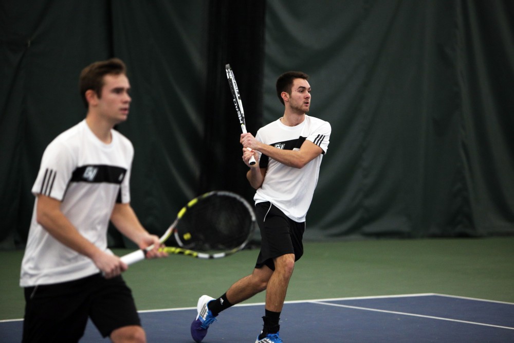 GVL / Emily Frye 
Junior Zach Phillips gets ready to return the serve on Feb. 14, 2016. 