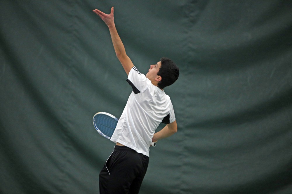 GVL / Emily Frye
Freshman Nick Urban prepares to serve on Friday Feb. 19, 2016.