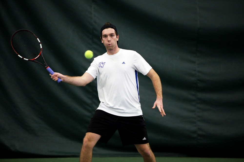 GVL / Emily Frye 
Senior Michael Kaye prepares to return the serve against Davenport University on Friday Feb. 19, 2016.