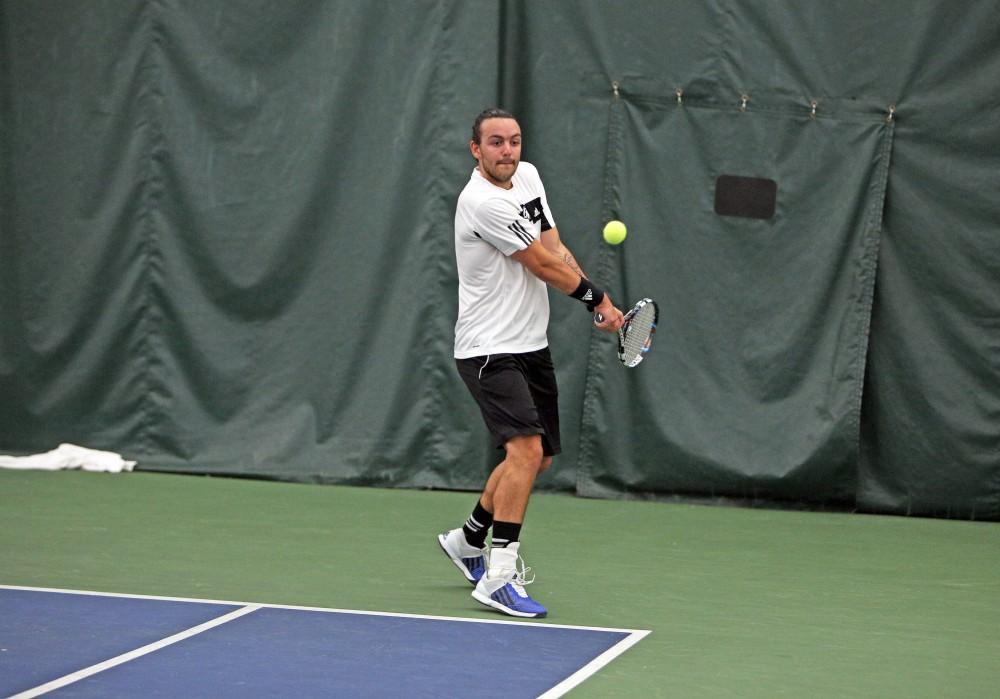 GVL / Emily Frye 
Senior Andrew Bole prepares to return the serve against Davenport University on Friday Feb. 19, 2016.