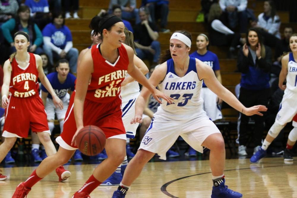 GVL / Adam Knorr - Kayla Dawson (23) defends a Ferris State point guard. The Lakers down the Bulldogs of Ferris State with a final score of 80-46 Thursday, Feb. 25, 2016 in Allendale. 