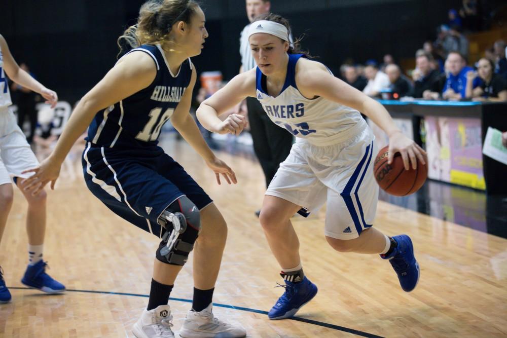 GVL / Kevin Sielaff - Kayla Dawson (23) moves in toward the basket.  The Lakers defeat the Chargers of Hillsdale College Saturday, Jan. 30, 2016 in Allendale.