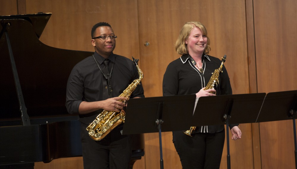 GVL / Kevin Sielaff - Lindsay Myers and Darwin McMurray, saxophones, play Grand Duo Concertant Op. 55 composed by Jean Baptiste Singelee with the assistance of Thomas Moss on piano. The Alex Aninos Scholarship Recital is held Friday, March 25, 2016 inside Grand Valley's Cook-DeWitt Center in Allendale. 