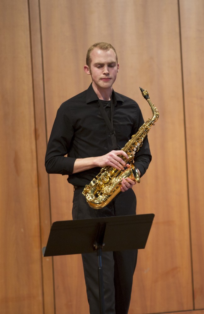 GVL / Kevin Sielaff - Karsten Wimbush, saxophone, plays In Dreams and Memories composed by Karsten Wimbush. The Alex Aninos Scholarship Recital is held Friday, March 25, 2016 inside Grand Valley's Cook-DeWitt Center in Allendale. 