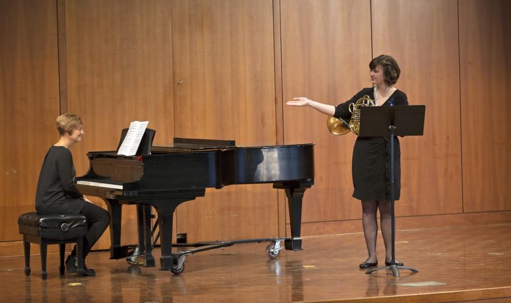 GVL / Kevin Sielaff - Emily Twa, horn, plays Horn Concerto Op. 8 by Franz Strauss with the assistance of Judy Roelofs on piano. The Alex Aninos Scholarship Recital is held Friday, March 25, 2016 inside Grand Valley's Cook-DeWitt Center in Allendale. 