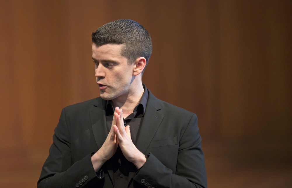 GVL / Kevin Sielaff - Dr. Daniel Graser gives his opening remarks before the start of the concert. The Alex Aninos Scholarship Recital is held Friday, March 25, 2016 inside Grand Valley's Cook-DeWitt Center in Allendale. 