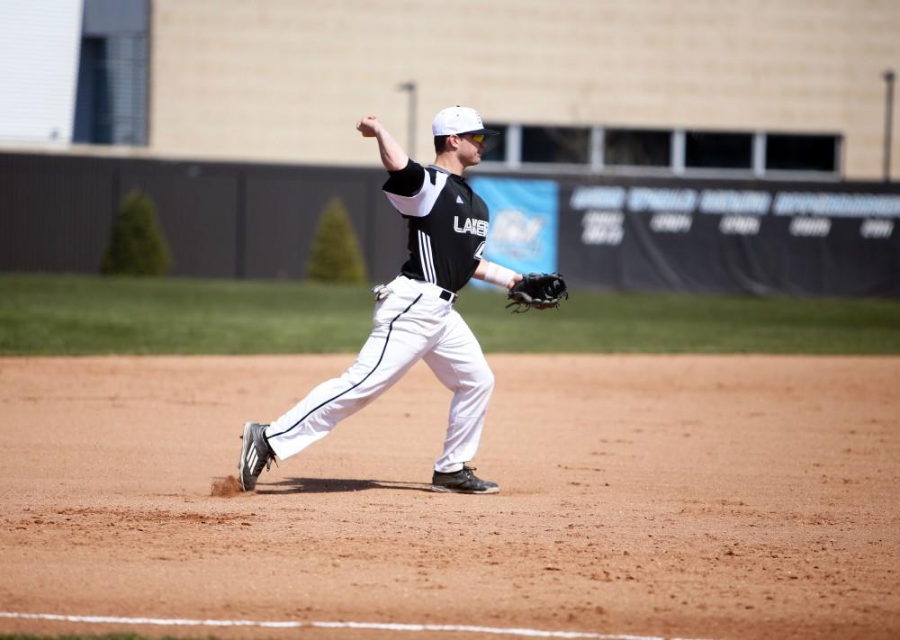 GVL / Emily Frye 
Infielder Anthony Villar makes a play at first base against Saginaw Valley State University on Saturday Mar. 26, 2016. 