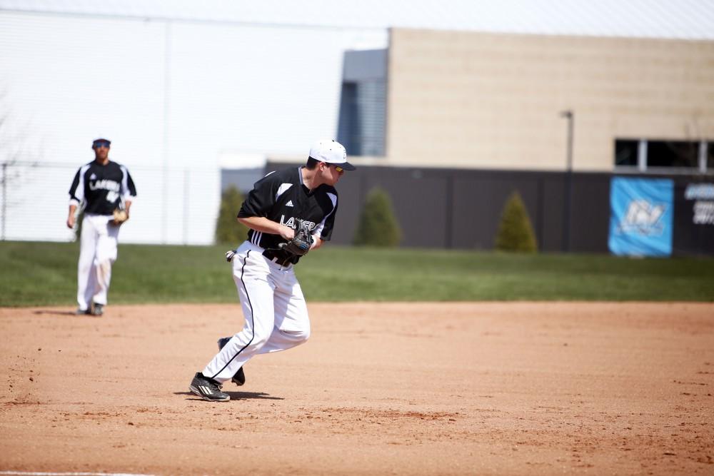 GVL / Emily Frye 
Infielder Anthony Villar makes a play at first base against Saginaw Valley State University on Saturday Mar. 26, 2016. 