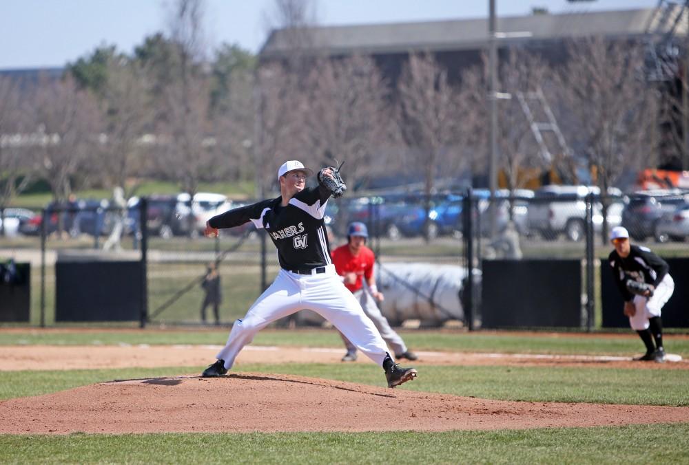 GVL / Emily Frye 
Senior Josh Griffith starts the Lakers off against Saginaw Valley State University on Saturday Mar. 26, 2016. 