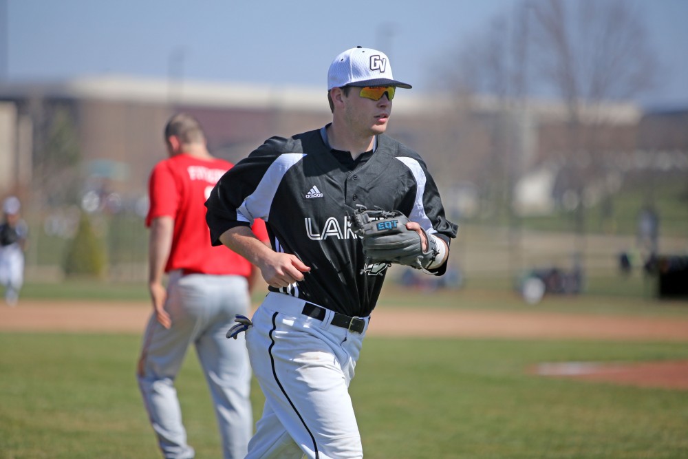 GVL / Emily Frye 
Infielder Anthony Villar runs off the field between innings against Saginaw Valley State University on Saturday Mar. 26, 2016. 