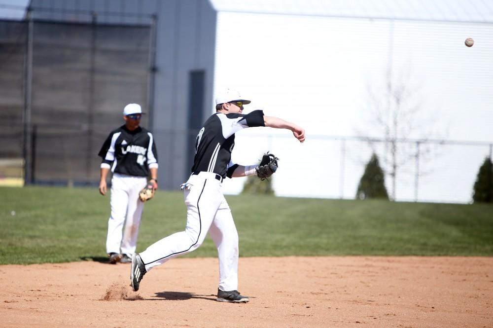 GVL / Emily Frye 
Infielder Anthony Villar makes a play at first base against Saginaw Valley State University on Saturday Mar. 26, 2016. 