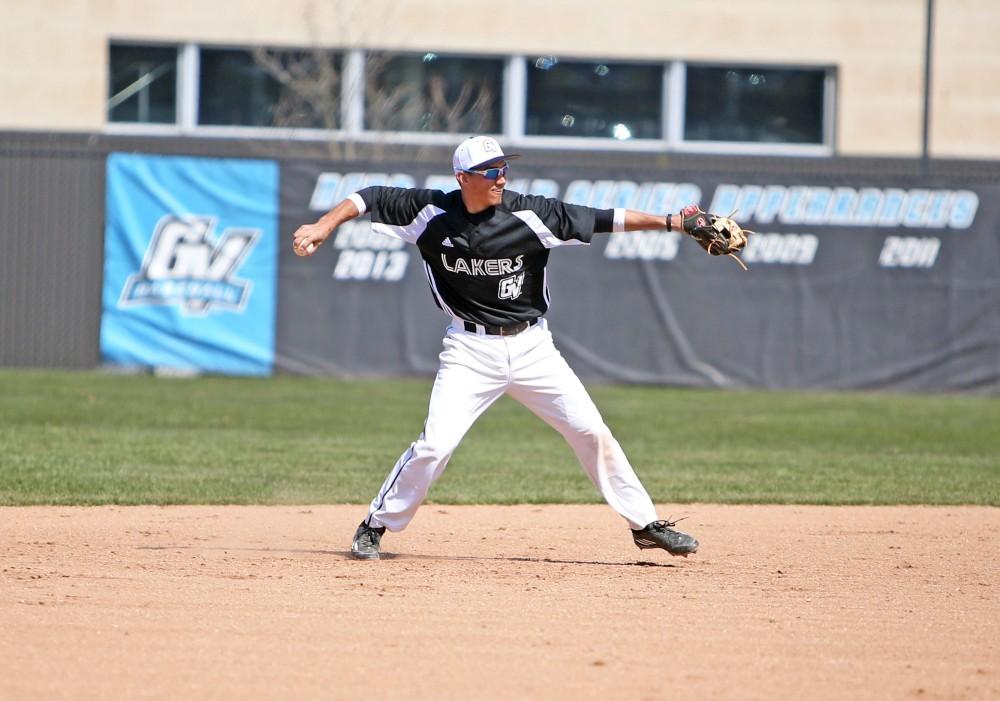 GVL / Emily Frye 
Infielder Johnny Nate makes a play at first base against Saginaw Valley State University on Saturday Mar. 26, 2016. 