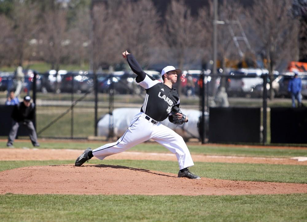 GVL / Emily Frye   
Senior Josh Griffith starts the lakers off against Saginaw Valley State University on Saturday Mar. 26, 2016.