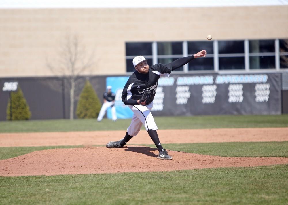 GVL / Emily Frye   
Senior Tim Tartar takes his place on the mound against Saginaw Valley State University on Saturday Mar. 26, 2016.