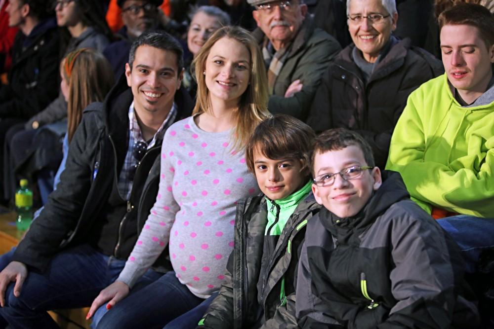 GVL / Emily Frye 
(From left to right) Jason, Tiffany, Maddox, and Jaden Sosa patiently await Bernie Sanders' arrival at Grand Valley State University on Friday Mar. 4, 2016. 