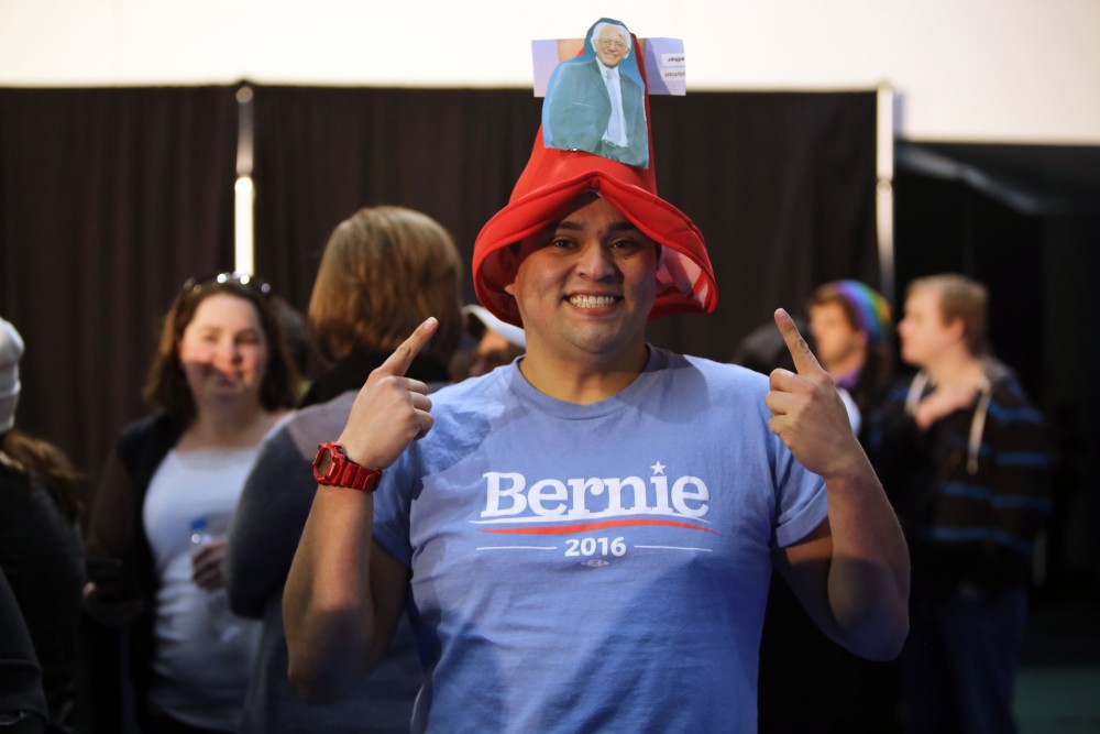 GVL / Emily Frye
Carlos Damas excitedly awaits Bernie Sanders arrival at Grand Valley State University on Friday Mar. 4, 2016. 