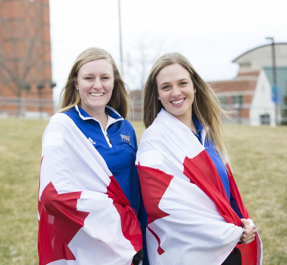 GVL / Kevin Sielaff - Alexandra Amos (left) and Alex Taylor (right) pose for a photo outside of Grand Valley’s Kirkhof Center on Wednesday, March 30, 2016.