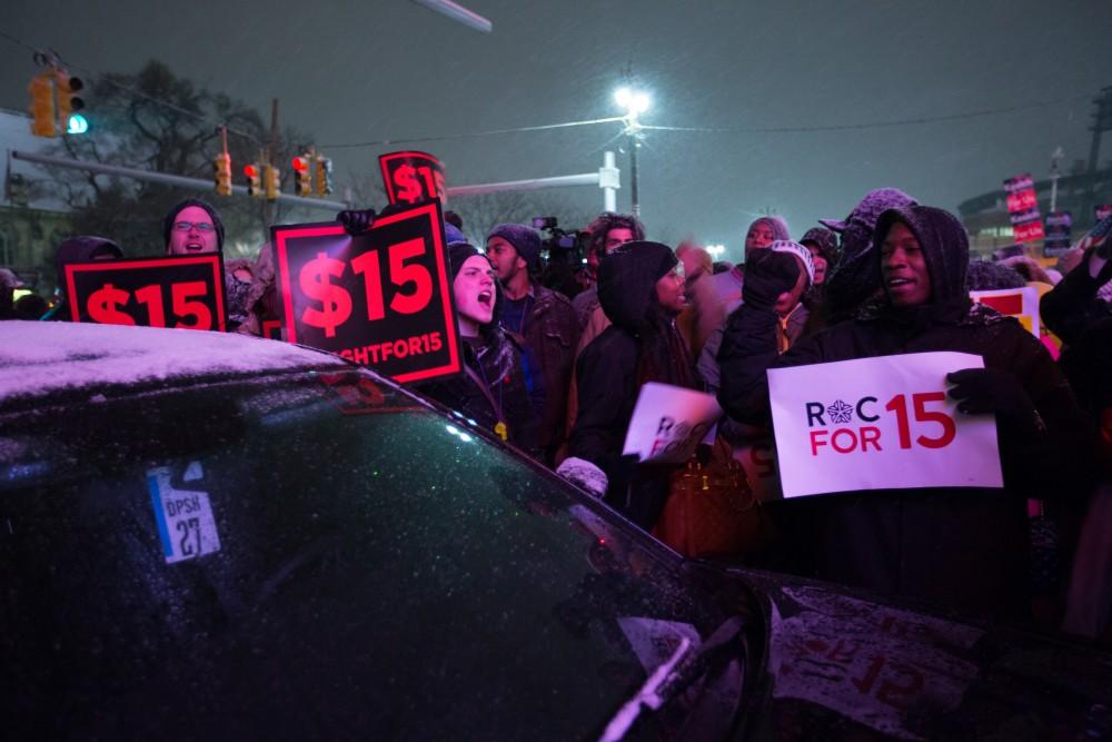 GVL / Kevin Sielaff - Protesters gather outside of the Fox Theater in Detroit, MI on Friday, March 4, 2016 to voice their opinions about the GOP candidates.