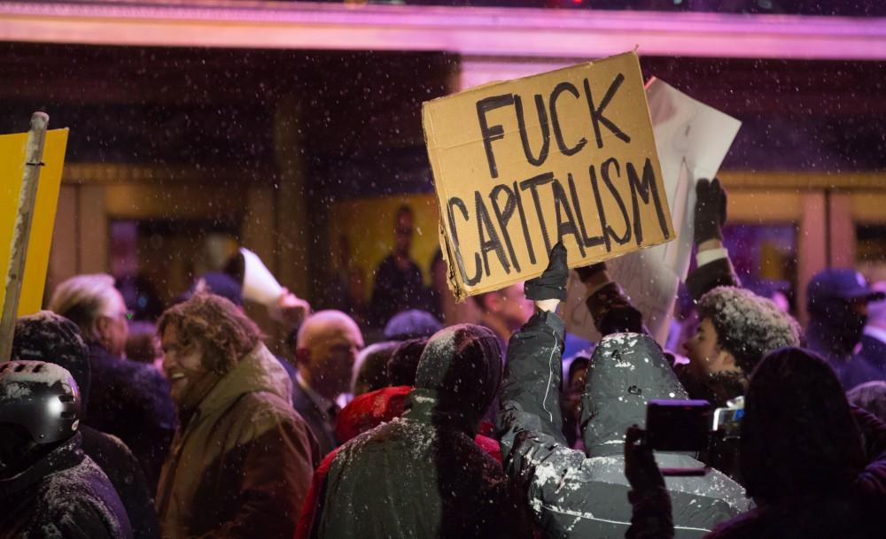 GVL / Kevin Sielaff - Protesters gather outside of the Fox Theater in Detroit, MI on Friday, March 4, 2016 to voice their opinions about the GOP candidates.