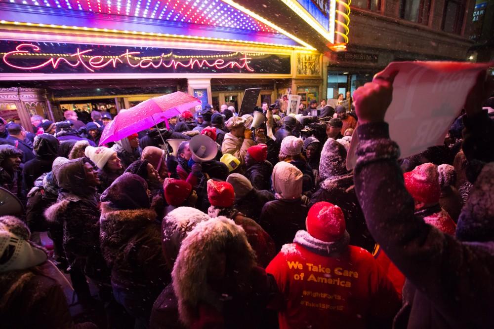 GVL / Kevin Sielaff - Protesters gather outside of the Fox Theater in Detroit, MI on Friday, March 4, 2016 to voice their opinions about the GOP candidates.