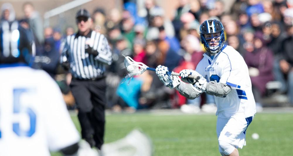 GVL / Kevin Sielaff – Grand Valley’s men’s lacrosse team squares off against Siena Heights University Sunday, March 20, 2016 in Allendale.