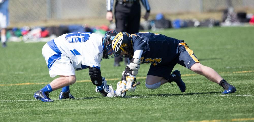 GVL / Kevin Sielaff – Grand Valley’s men’s lacrosse team squares off against Siena Heights University Sunday, March 20, 2016 in Allendale.