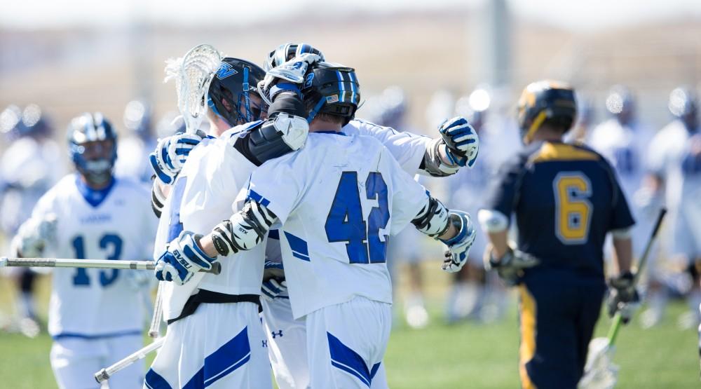 GVL / Kevin Sielaff – Grand Valley’s men’s lacrosse team squares off against Siena Heights University Sunday, March 20, 2016 in Allendale.