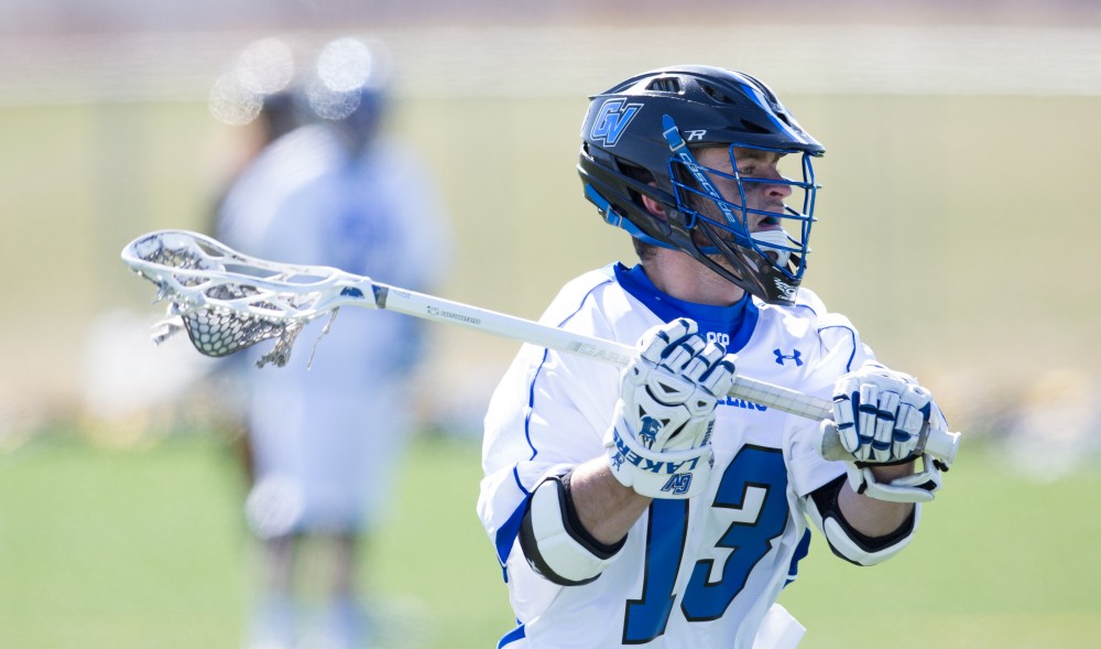 GVL / Kevin Sielaff – Grand Valley’s men’s lacrosse team squares off against Siena Heights University Sunday, March 20, 2016 in Allendale.