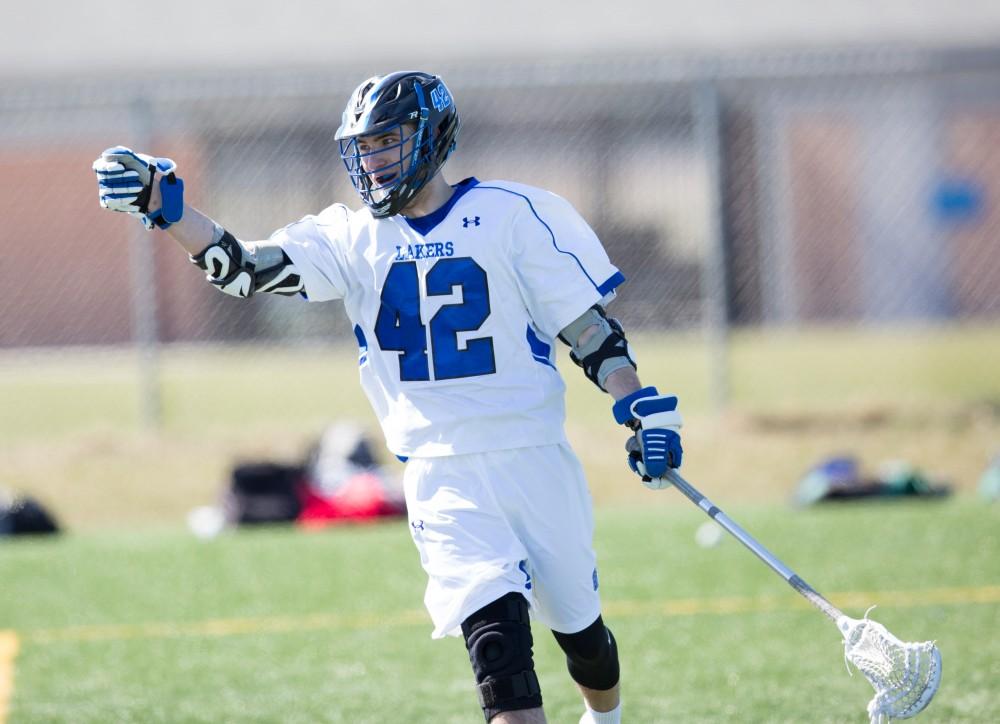 GVL / Kevin Sielaff – Jakob Kippola (42) celebrates a goal. Grand Valley’s men’s lacrosse team squares off against Siena Heights University Sunday, March 20, 2016 in Allendale.