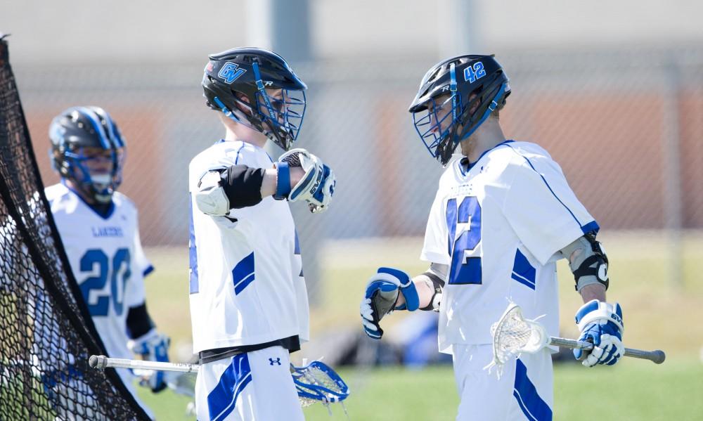 GVL / Kevin Sielaff – Jakob Kippola (42) celebrates a goal. Grand Valley’s men’s lacrosse team squares off against Siena Heights University Sunday, March 20, 2016 in Allendale.