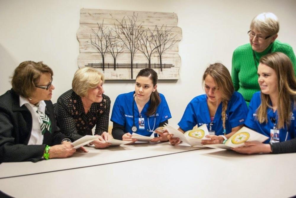GVL / Archive
Undergraduate nursing students Lauren Borucki, Gabrielle Troy, and Madison Dapprich, working in The Wesorick Center at Kirkhof College of Nursing with Dr. Evelyn Clingerman -  Executive Director of The Wesorick Center, and KCON faculty - Drs. Cindy Beel-Bates and Elaine Van Doren.