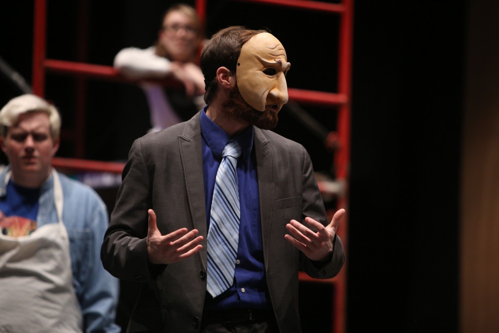 GVL / Emily Frye 
Justin Mackey, along with his fellow cast mates, rehearse a scene from the upcoming play "Six Characters Theater Performance" on Thursday Mar. 24, 2016. 