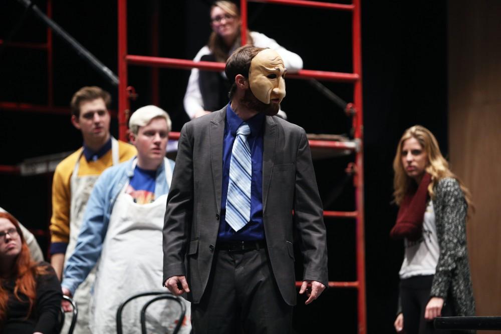 GVL / Emily Frye 
Justin Mackey, along with his fellow cast mates, rehearse a scene from the upcoming play "Six Characters Theater Performance" on Thursday Mar. 24, 2016. 