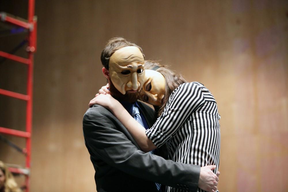 GVL / Emily Frye 
Justin Mackey and Charlie Wilburn, from the upcoming play "Six Characters Theater Performance", share an embrass during a rehearsal scene on Thursday Mar. 24, 2016. 